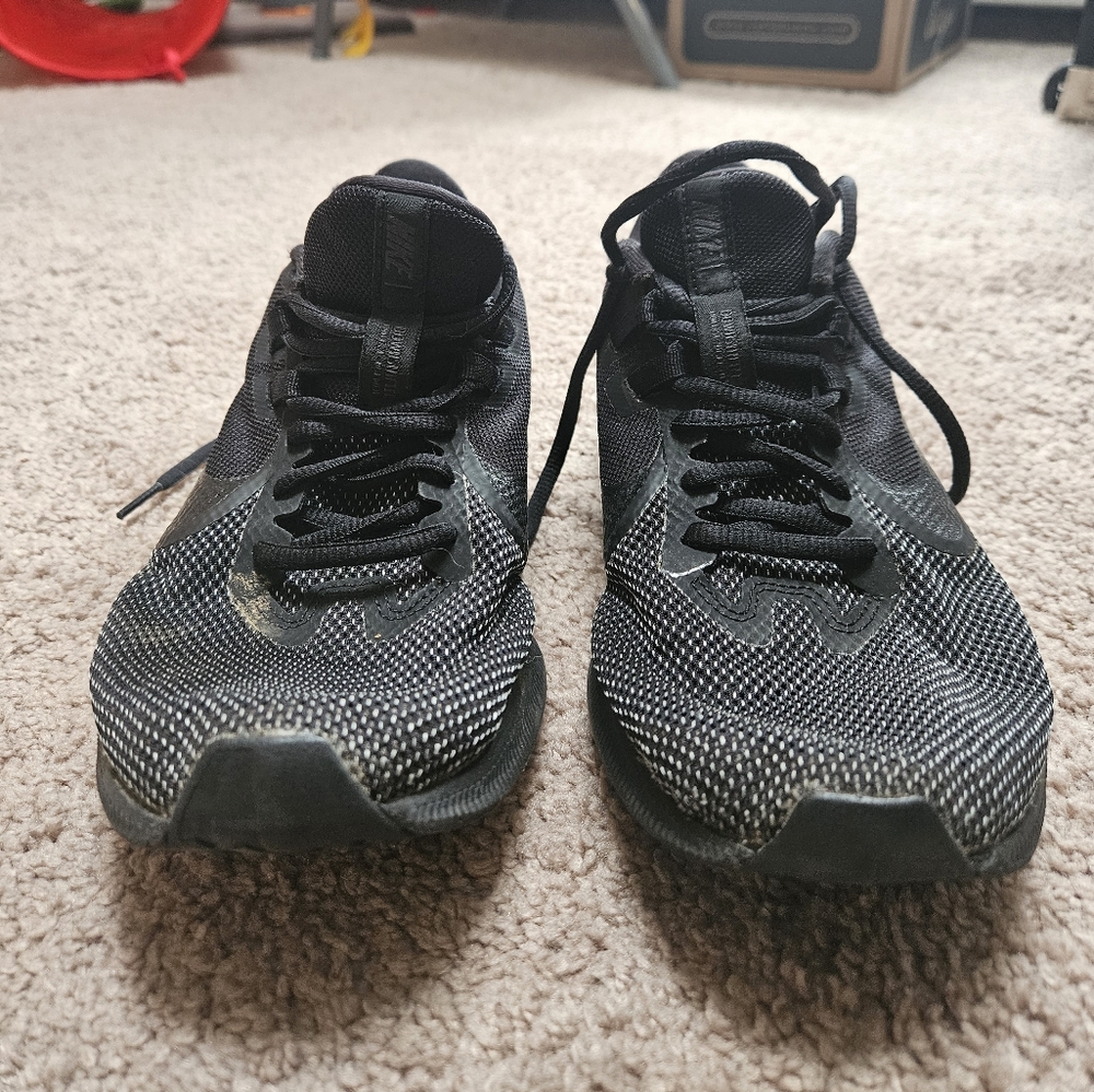 Black Nike running shoes